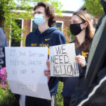 mental health protest with signs